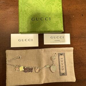 Gucci charm bracelet with dust cover and original packaging